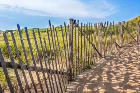 a fence on the side of a beach at 4 Min Drive to Bayside Beaches in Eastham