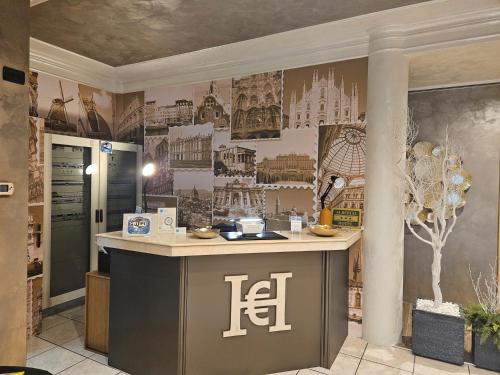 a kitchen with a island in the middle of a room at Hotel Euro in Castegnato