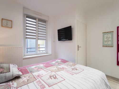 Ένα ή περισσότερα κρεβάτια σε δωμάτιο στο Residence Louis Quartier Gare