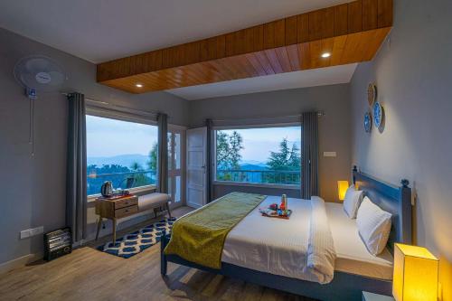 a bedroom with a large bed and a window at Serene By Sunkissed Villa in Kasauli