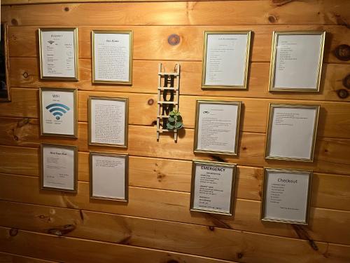 a wall with a bunch of papers on it at Twin Oaks in Bryson City