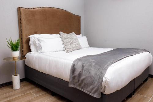 Katil atau katil-katil dalam bilik di Uptown Apartments - Garden Pavillion