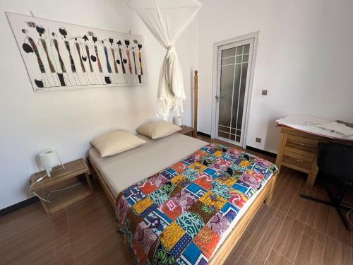 Ένα ή περισσότερα κρεβάτια σε δωμάτιο στο MAISON PROCHE MER LAGUNE INTERNET CANAL