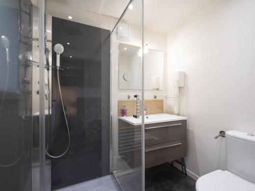 Ένα μπάνιο στο Residence Louis Quartier Gare