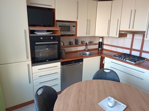 Kuchyň nebo kuchyňský kout v ubytování Apartmán Kolářová