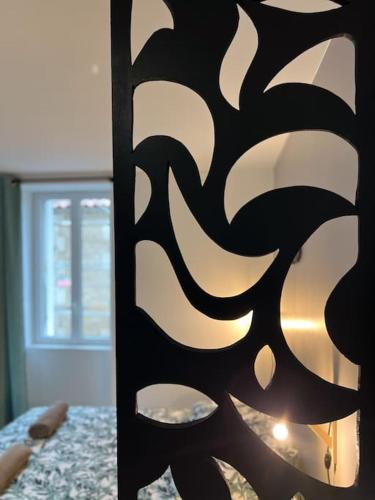 Ein Bett oder Betten in einem Zimmer der Unterkunft LA FEUILLERAIE N2-Standingappart-Wifi-Proche ville