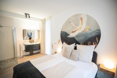 Un pat sau paturi într-o cameră la Residenz - Haus Luft - Penthouse - Sauna - Parkplatz