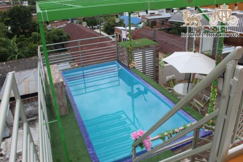an overhead view of a swimming pool at a hotel at ROYALPARK in Venadillo
