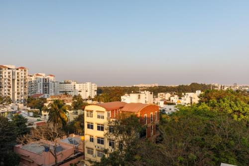 a view of a city with buildings and trees at Mistyblue Stays in Bengaluru