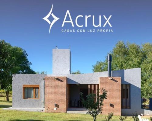 a rendering of a house with the words acuix at Casas Acrux in Nono