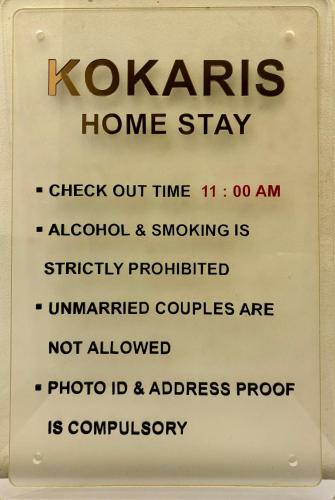 a sign that says kazaris home stay at Kokaris Coorg Homestay in Kushālnagar
