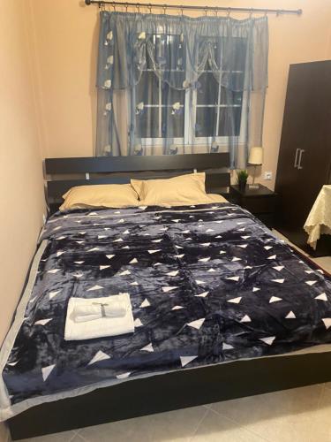 Postel nebo postele na pokoji v ubytování Dimitris Rooms