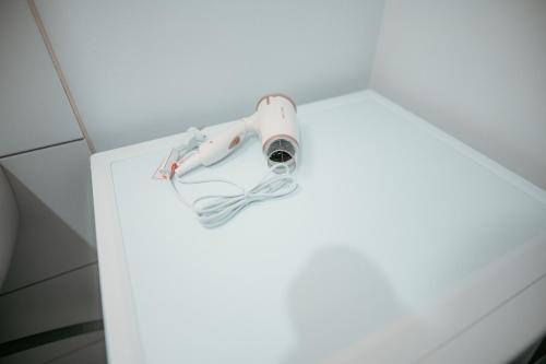 a white table with a camera on top of it at Vienna Cosy Apartment 107 in Vienna
