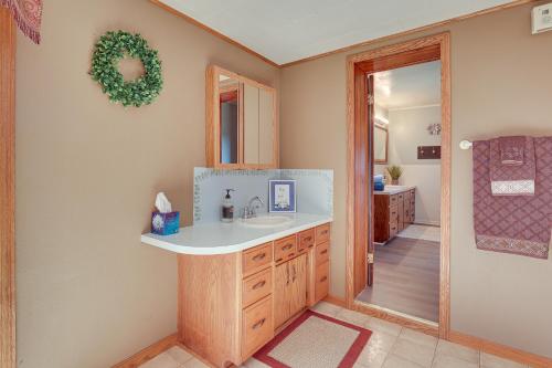 a bathroom with a sink and a mirror at Charming Dundee Vacation Rental Near Hiking! in Dundee