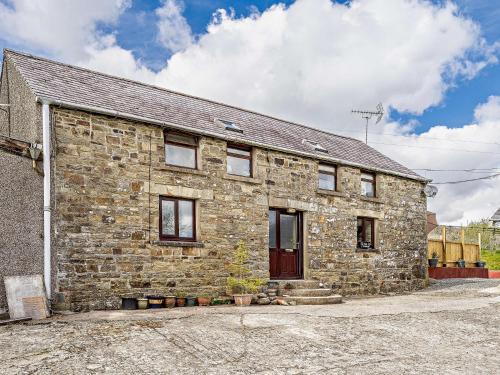 an old stone house with a brick at 2 bed property in Brynteg West Wales 81353 in Llanwenog