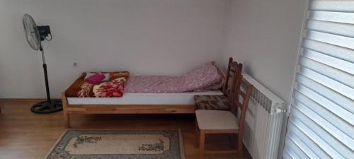 Tempat tidur dalam kamar di Aura City 2