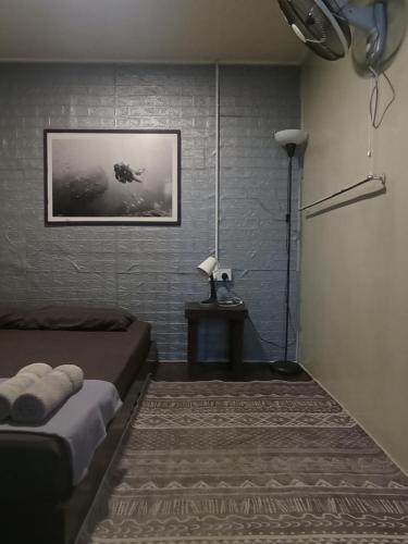 Postel nebo postele na pokoji v ubytování Seahorse Diver Guesthouse