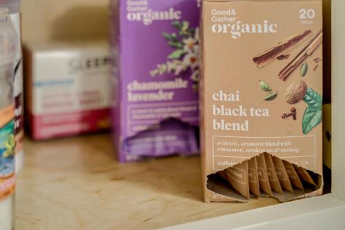a box of chalk black tea blend on a shelf at Bright & Cozy Modern Studio, Fast WiFi, Quiet, Walkable to University of Portland in Portland