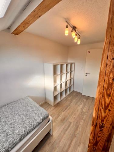 Postel nebo postele na pokoji v ubytování MC MONTI Gießen - Lich, 70qm, Zentral, NETFLIX