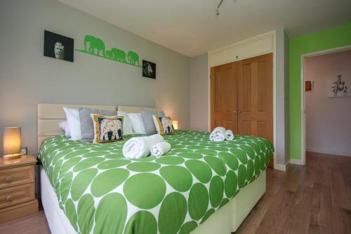 Ένα ή περισσότερα κρεβάτια σε δωμάτιο στο Dog Friendly Appartement In Sandbanks Peninsula