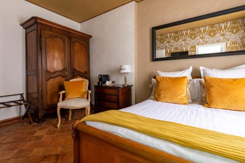Una cama o camas en una habitación de Chez Camille