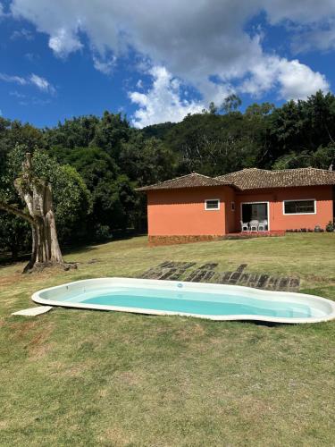 Πισίνα στο ή κοντά στο Casa aconchego Secretário