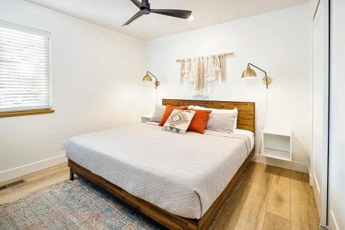 a bedroom with a bed and a ceiling fan at Near Downtown Stylish 2BR With Amazing Patio - 5 in Moab