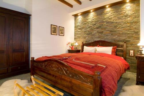 Ένα ή περισσότερα κρεβάτια σε δωμάτιο στο Αρχοντικό Ειρήνη - 4 Metsovo
