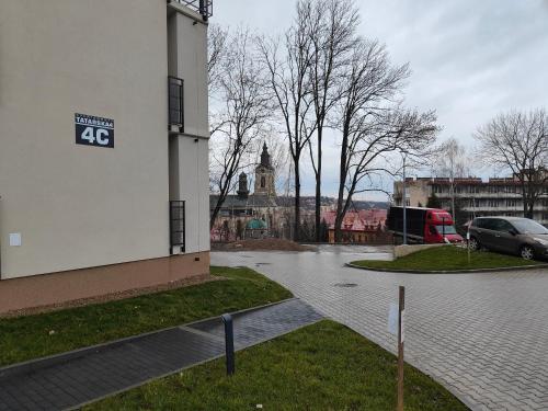a building with a sign on the side of it at Apartament na Tatarskiej z widokiem in Przemyśl