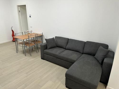 Un lugar para sentarse en CASA IDEALE TIM Appartmanti moderni vicina al centro