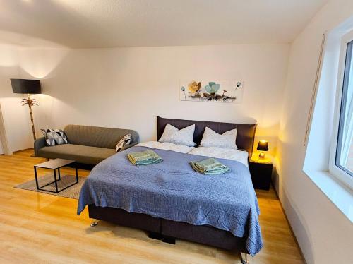 Ένα ή περισσότερα κρεβάτια σε δωμάτιο στο Family Apartment 6 Pers,2SchlafZi, BadZi, Küche