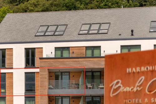 an external view of a building with windows at Four The Reach in Salcombe