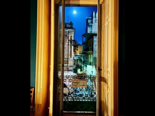 a glass window with a view of a city at Dream 117 in Catania