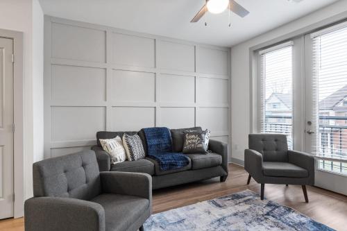 a living room with a couch and two chairs at Charming 1BR 1BA Apartment Near Downtown Cincinnati in Cincinnati