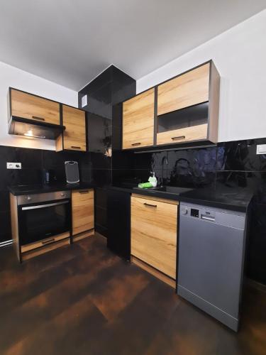 Kuchyňa alebo kuchynka v ubytovaní Apartament Green Prince