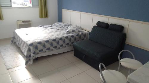 Кровать или кровати в номере Pousada
