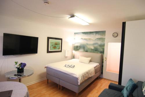 Ένα ή περισσότερα κρεβάτια σε δωμάτιο στο Ferienwohnung Koje 16