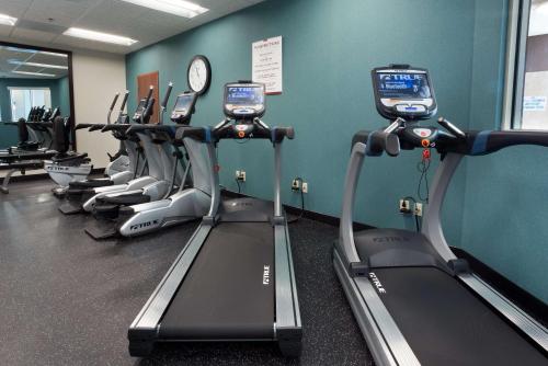 a row of cardio machines in a gym at Drury Inn & Suites Burlington in Burlington