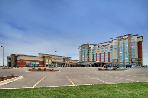 a parking lot in front of a large building at Drury Plaza Hotel Cape Girardeau Conference Center in Cape Girardeau