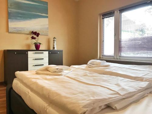 Ένα ή περισσότερα κρεβάτια σε δωμάτιο στο Ferienhaus Franzy