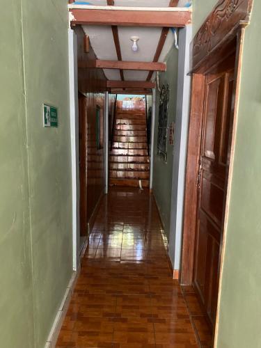 a hallway of a house with a wooden ceiling at Hotel Pacific Surf with AC Best Room In Tunco Beach in Tamanique