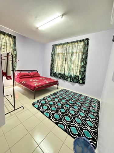 Giường trong phòng chung tại D’ QR Homestay Kuantan