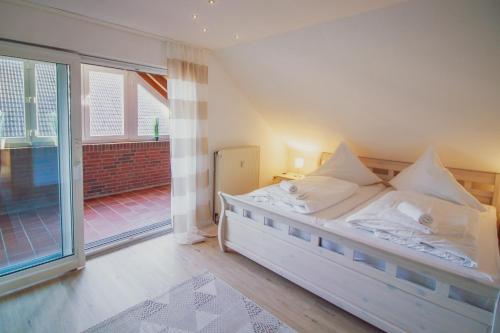 Postel nebo postele na pokoji v ubytování Ferienhaus Sita