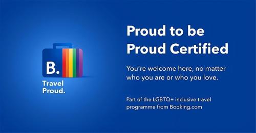 a sign that reads proud to be proud certified with a suitcase at Townhouse 3 in Broken Hill