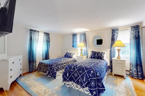 Katil atau katil-katil dalam bilik di Coastal Charm on the Cape