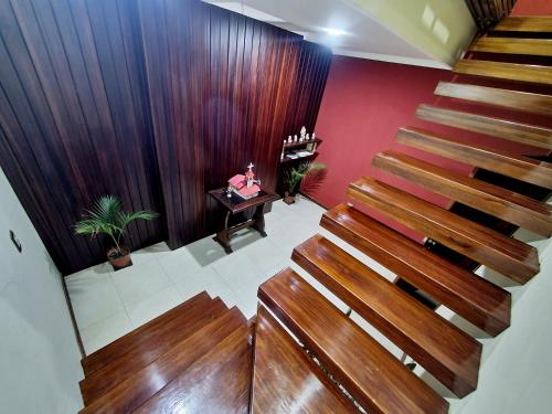 an overhead view of a staircase in a room at Beautiful view suite Suite vista hermosa in Macas