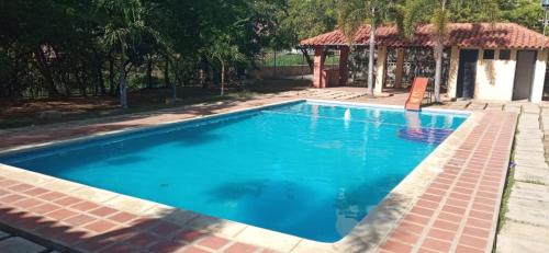 Swimmingpoolen hos eller tæt på Hermoso Apartamento tipo Loft en Lecheria Anzoátegui