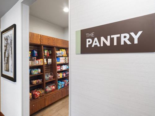a pantry with a sign that reads the pantry at Staybridge Suites Midvale by IHG in Midvale
