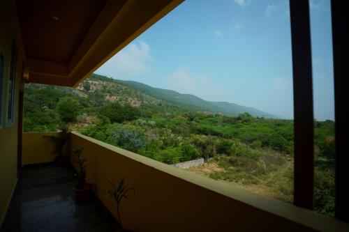 a view from the balcony of a house at Sri Govindham Home Stay in Tirupati