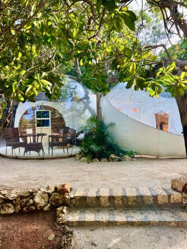 a large tent with a table and chairs in it at Rock and Sea Resort in Watamu
